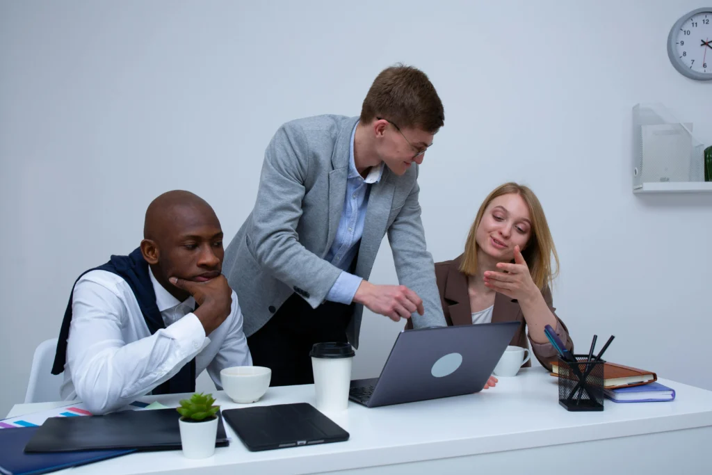 Financial advisor discussing personalized tax strategies with high net worth clients in a modern office
